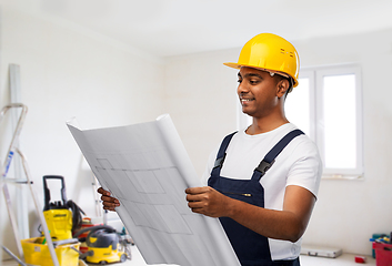 Image showing happy indian builder in helmet with blueprint