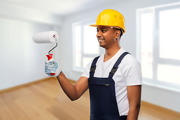 Image showing happy indian painter or builder with paint roller