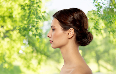 Image showing profile of beautiful woman with bare shoulders