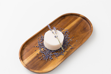 Image showing close up of crafted lavender soap on wooden tray