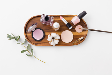 Image showing makeup, perfume and cosmetics on wooden tray