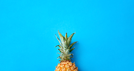 Image showing close up of pineapple on blue background