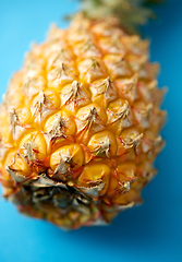 Image showing close up of pineapple on blue background