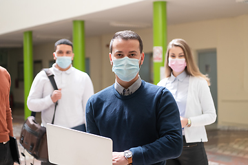 Image showing Multiethnic students group wearing protective face mask