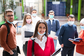 Image showing Portrait of multiethnic students group at university wearing protective face mask