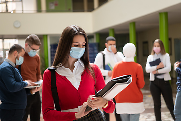 Image showing Portrait of multiethnic students group at university wearing protective face mask