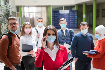 Image showing Portrait of multiethnic students group at university wearing protective face mask