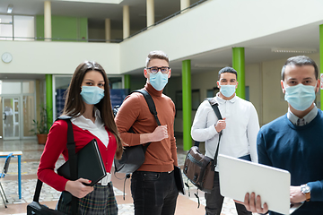 Image showing Multiethnic students group wearing protective face mask