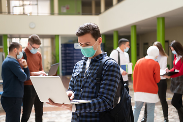 Image showing Portrait of multiethnic students group at university wearing protective face mask