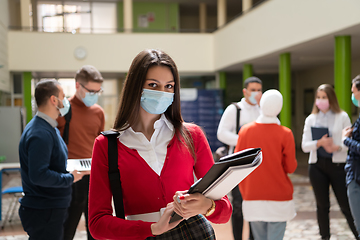 Image showing Portrait of multiethnic students group at university wearing protective face mask