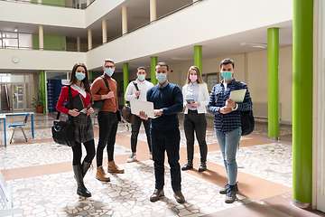 Image showing Multiethnic students group wearing protective face mask