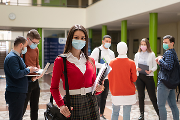 Image showing Portrait of multiethnic students group at university wearing protective face mask