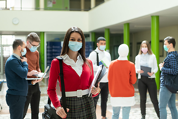 Image showing Portrait of multiethnic students group at university wearing protective face mask