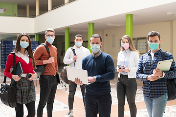 Image showing Multiethnic students group wearing protective face mask