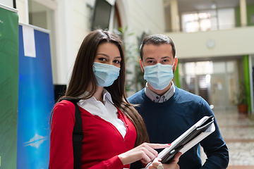 Image showing Portrait of multiethnic students group at university wearing protective face mask