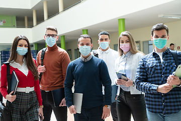 Image showing Multiethnic students group wearing protective face mask