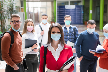 Image showing students group at university walking and wearing face mask