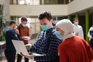 Image showing Portrait of multiethnic students group at university wearing protective face mask