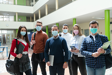 Image showing Multiethnic students group wearing protective face mask