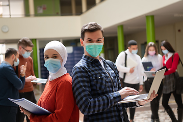 Image showing Portrait of multiethnic students group at university wearing protective face mask