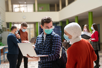 Image showing Portrait of multiethnic students group at university wearing protective face mask