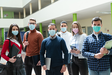 Image showing Multiethnic students group wearing protective face mask