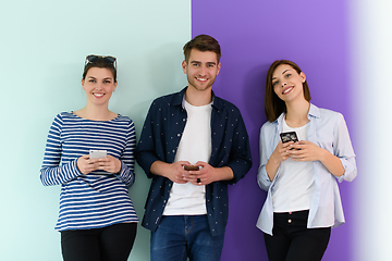 Image showing a group of teenagers use mobile devices