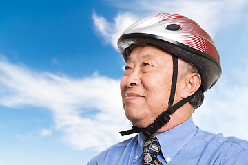 Image showing Active senior asian businessman