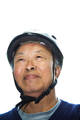 Image showing Senior asian man with bike helmet