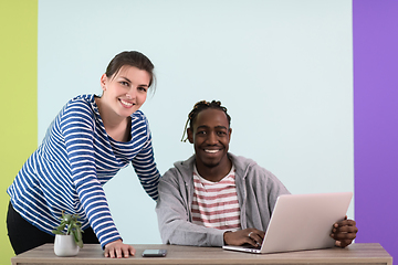 Image showing merican and a young girl plan meetings together and use a laptop for an online meeting