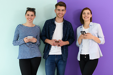 Image showing a group of teenagers use mobile devices