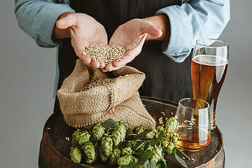 Image showing Close up of confident senior man brewer with self crafted beer