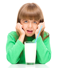 Image showing Little girl with a glass of milk