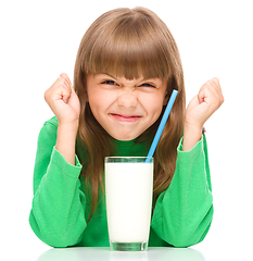 Image showing Little girl with a glass of milk