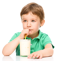 Image showing Cute little boy with a glass of milk