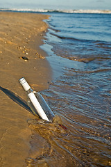 Image showing message in a bottle