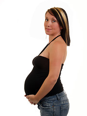 Image showing Young pregnant woman with big belly in black top