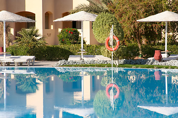 Image showing Pool area with lifebuoy