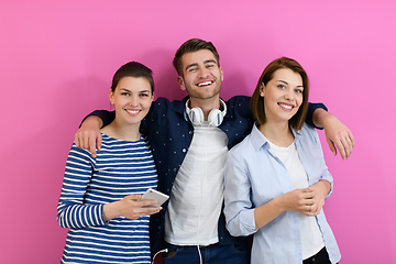 Image showing group of friends have fun and dance while using a cell phone and headphones