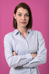 Image showing Portrati shot of beautiful blond businesswoman standing with arms crossed at isolated white background.