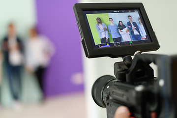 Image showing cameraman with professional equipment shoots video clips