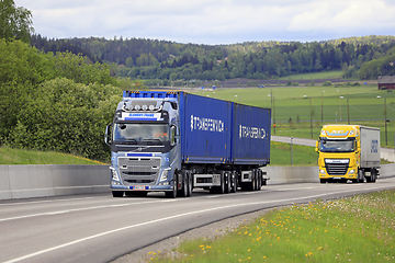 Image showing Colorful Freight Transporters on Road