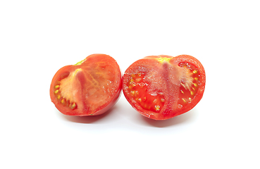 Image showing Cut red tomato on a white background