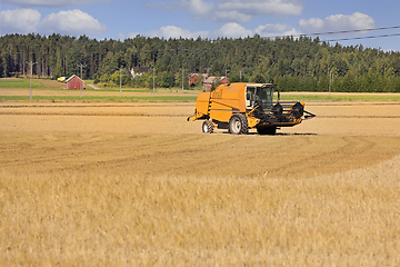 Image showing Agricultural Field Landscape with Combine