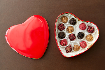 Image showing candies in red heart shaped chocolate box