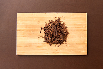 Image showing chocolate chips on wooden board