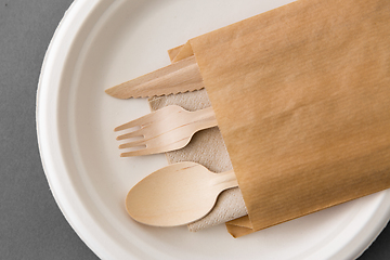 Image showing wooden spoon, fork and knife on paper plate