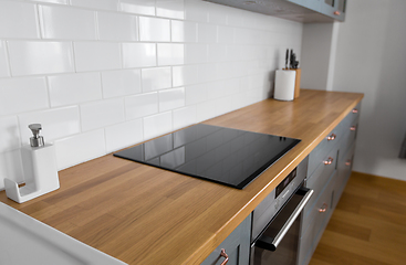 Image showing modern home kitchen interior with oven and hob