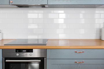 Image showing modern home kitchen interior with oven and hob