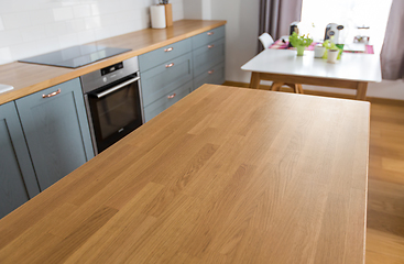 Image showing home kitchen interior with counter and table